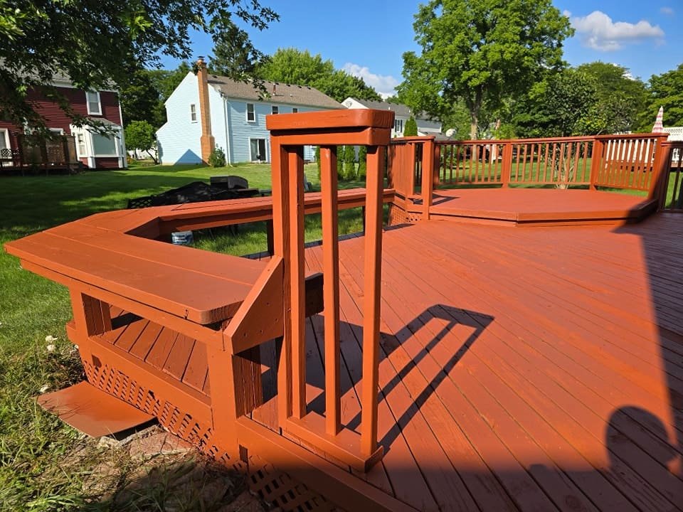 Deck Refinished stained by DLux Painting Metro Detroit