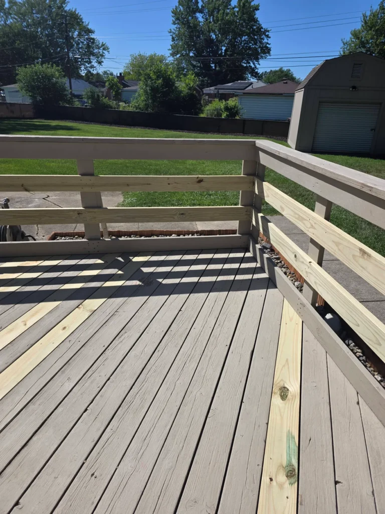 Deck board repair before staining by DLux Painting