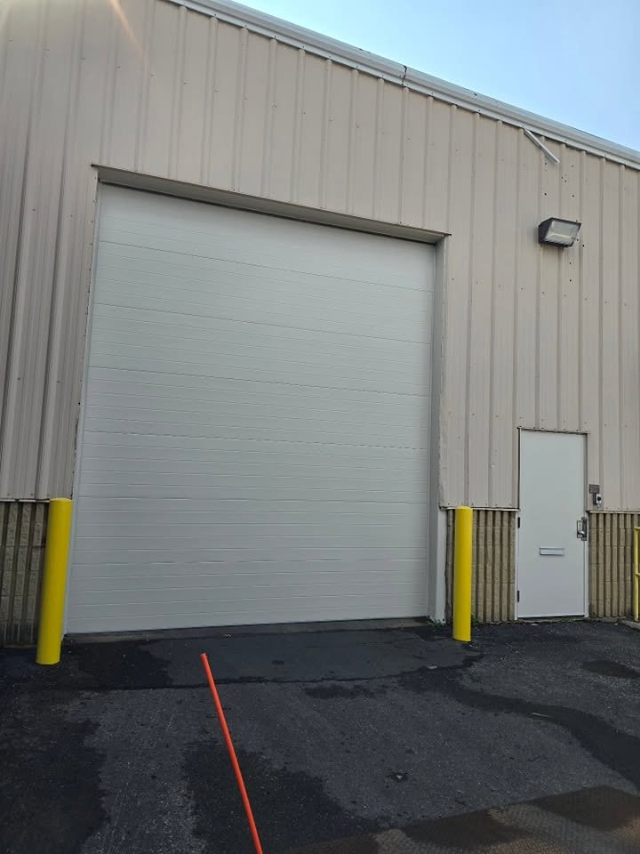 Close up of and industrial overhead door painted