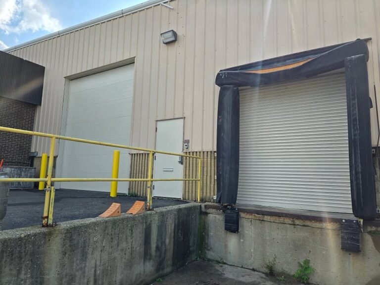 Industrial door painted by DLux Painting